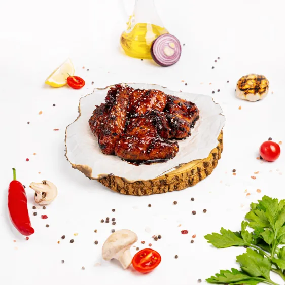 Курячі крильця карамелізовані